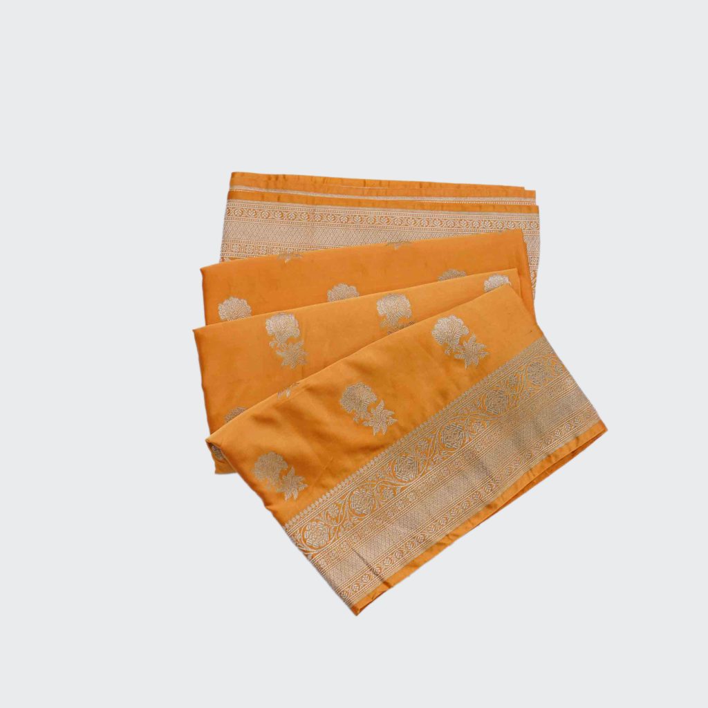 Golden Yellow Banaras Fancy Saree highlighted with Golden Zari Floral Design