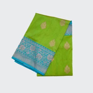 Kelly Green Banaras Pattu Saree with a contrasting sky blue pallu