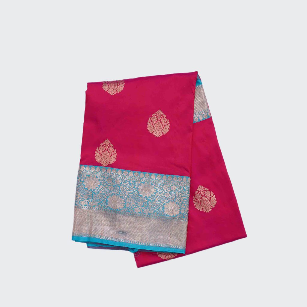 Rasberry Pink Banaras Pattu Saree highlighted with Golden Zari Floral Design in Sky Blue Pallu