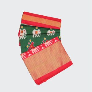 Brick RedBrick red and leaf green Pochampally pattu saree with bold ikat motifs on lustrous silk showcasing contrasting color panels and detailed handwoven texture