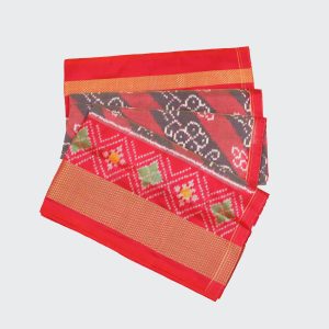Silk saree in candy apple red and gray Pochampally style, featuring traditional ikat designs and a smooth, lustrous drape ideal for festive and wedding wear