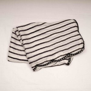 Crisp white designer saree with intricate thread embroidery, sequin embellishments, and premium fabric showcasing handcrafted elegance