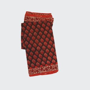 Dark red pure printed cotton saree with hand-block geometric motifs on slub cotton fabric showcasing vibrant color and artisanal craftsmanship