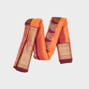 Flame orange Gadwal pattu saree with traditional handloom silk weaving patterns and vibrant orange color showing premium quality craftsmanship