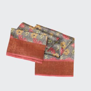 French gray Tussar silk saree showcasing fine plain weave texture, subtle sheen, and lightweight drape perfect for festive and daytime events