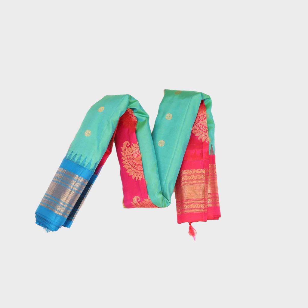 Beautiful ice blue colored Gadwal pattu saree with authentic silk texture and traditional handloom design for special occasions