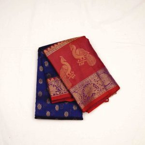 Ruby red Kuppadam pattu saree with rich silk texture, intricate handwoven weave, and subtle sheen showcasing traditional craftsmanship
